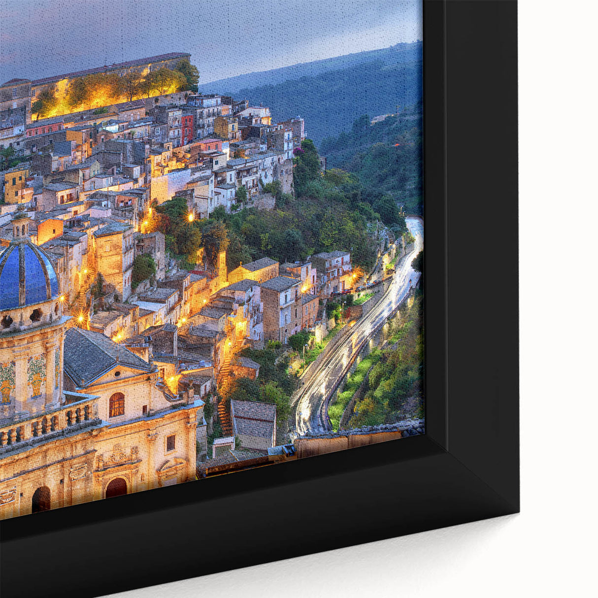 Close-up of textured black wall art depicting a colorful Sicilian landscape on a framed canvas, ideal for living room decor.