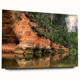 Large abstract art print of a European landscape in muted blue and green tones on acrylic glass.