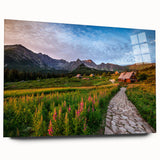 Large abstract wall art of a European scenery, in muted blues and greens on acrylic glass.