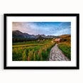 Extra large abstract art print featuring a colorful, textured depiction of a European scenery, framed in black.