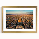 Abstract art print of Barcelona scenery in muted gold and blue tones on a framed canvas, suitable for dining room decor.