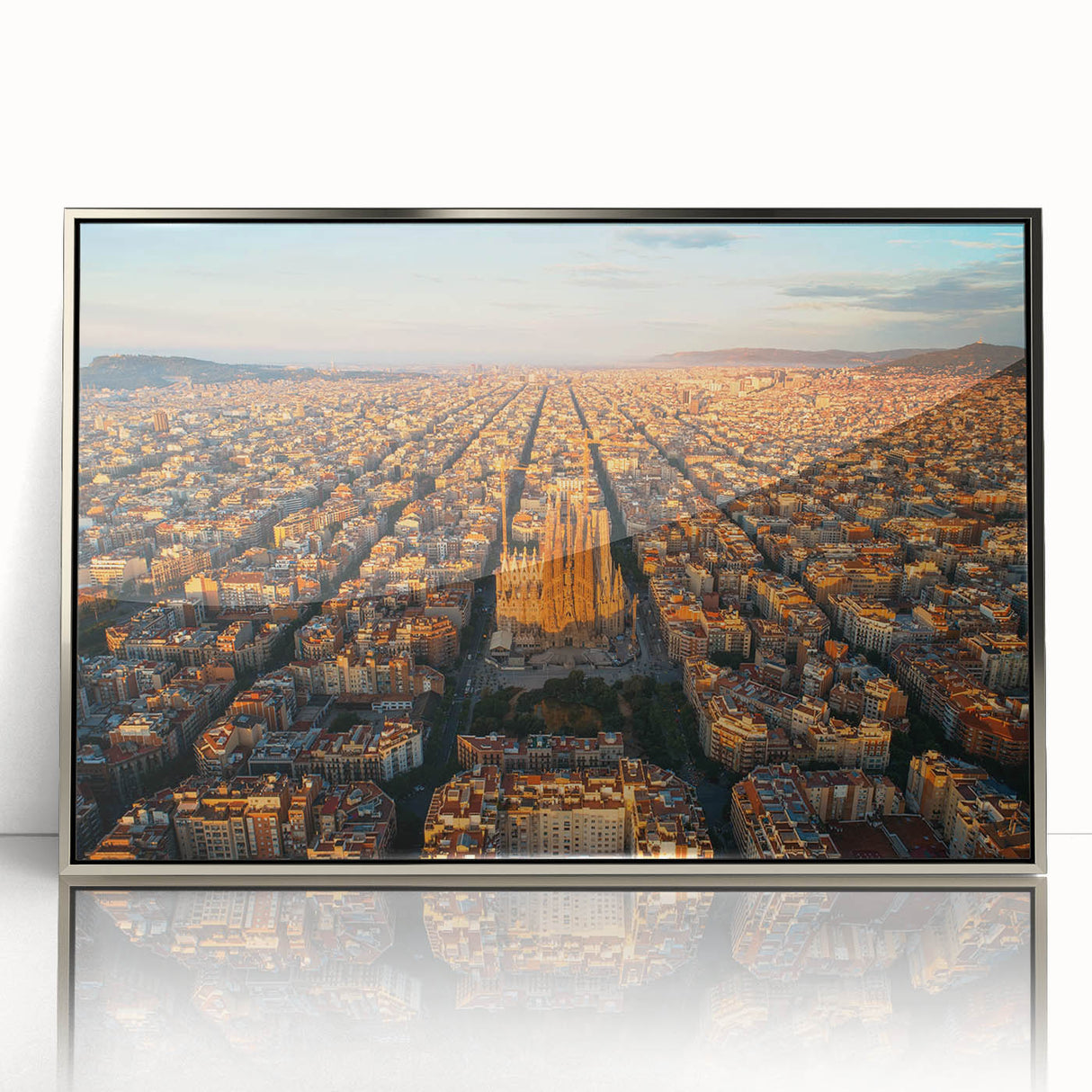 Large art print of Barcelona scenery in silver-framed acrylic, featuring mid-century modernist style.