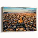Framed canvas wall art featuring a vintage-style landscape painting of Barcelona with black and gold hues.