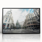 Large abstract wall art depicting the Madrid skyline in muted gray and gold tones on a framed acrylic canvas.