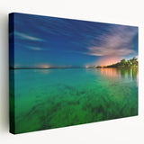 Large art depicting the Yucatan scenery in Mexico on a stretched canvas, featuring vivid green and blue tones.
