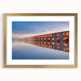 Extra large framed wall art featuring abstract textured scenery of a Middle Eastern landscape in gold and earth tones.