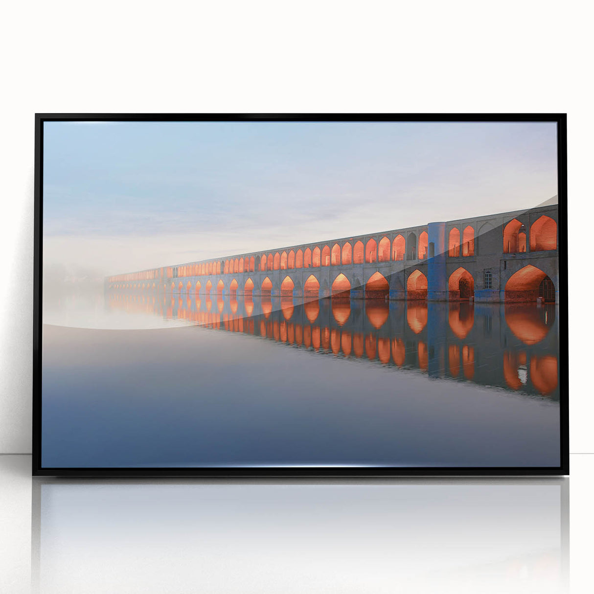 Large abstract wall art depicting a Middle Eastern scenery in muted earth tones on a framed acrylic.