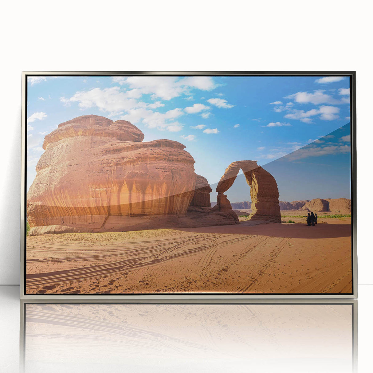 Mid-century modernist art depicting a Saudi Arabian landscape in muted earth tones on a silver-framed acrylic print.