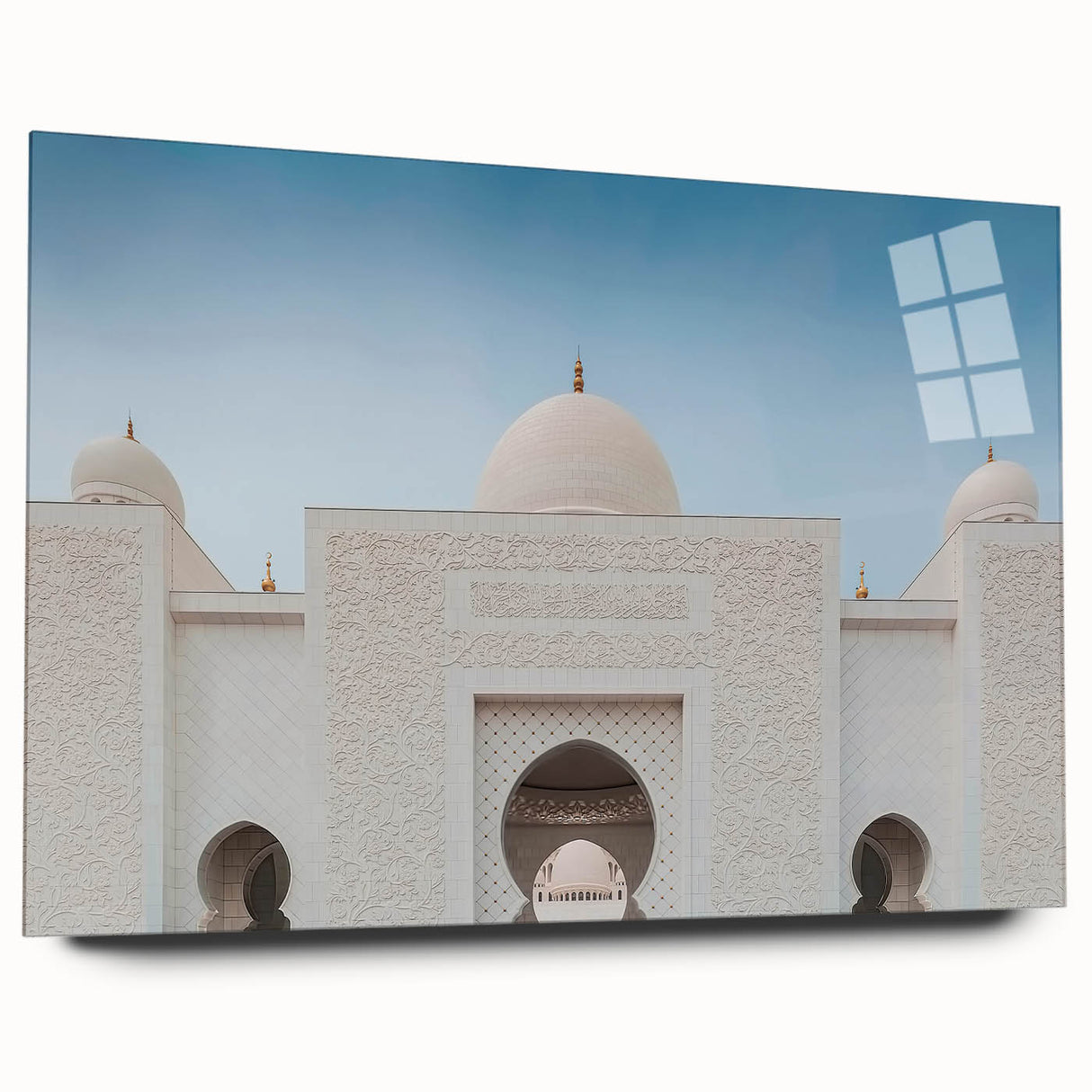 Large abstract wall art of Abu Dhabi skyline in muted gray and blue tones on acrylic glass.