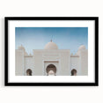 Abstract art print of a colorful, textured scenery, framed in black, ideal for living room decor.