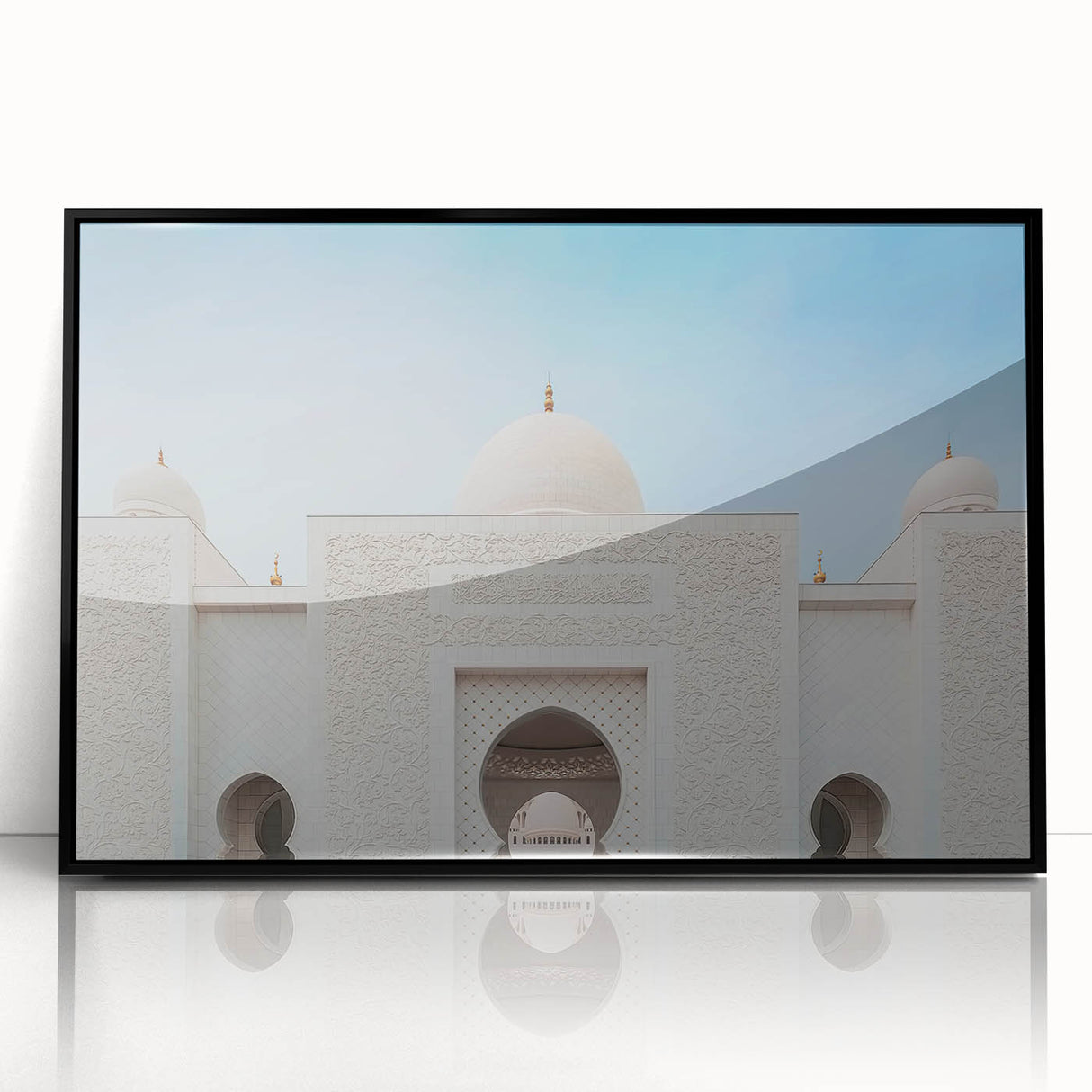 Large abstract wall art depicting the Abu Dhabi skyline in muted gray and blue tones, framed in black acrylic.