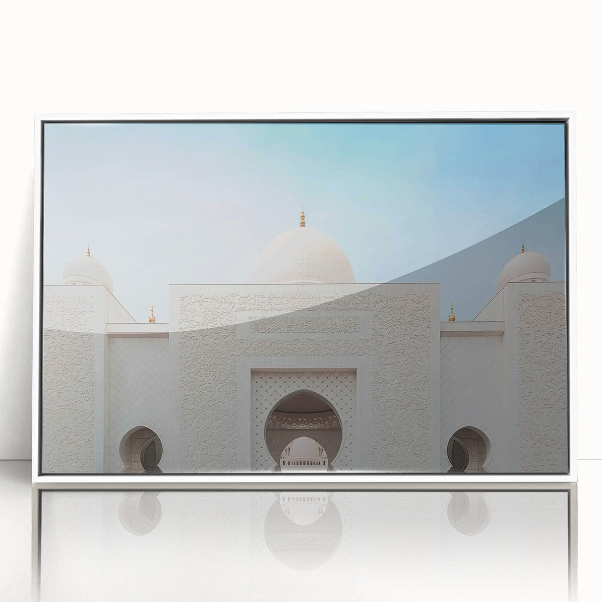 Modern art wall decor featuring a minimalist Abu Dhabi skyline in muted blues and grays on a white acrylic frame.