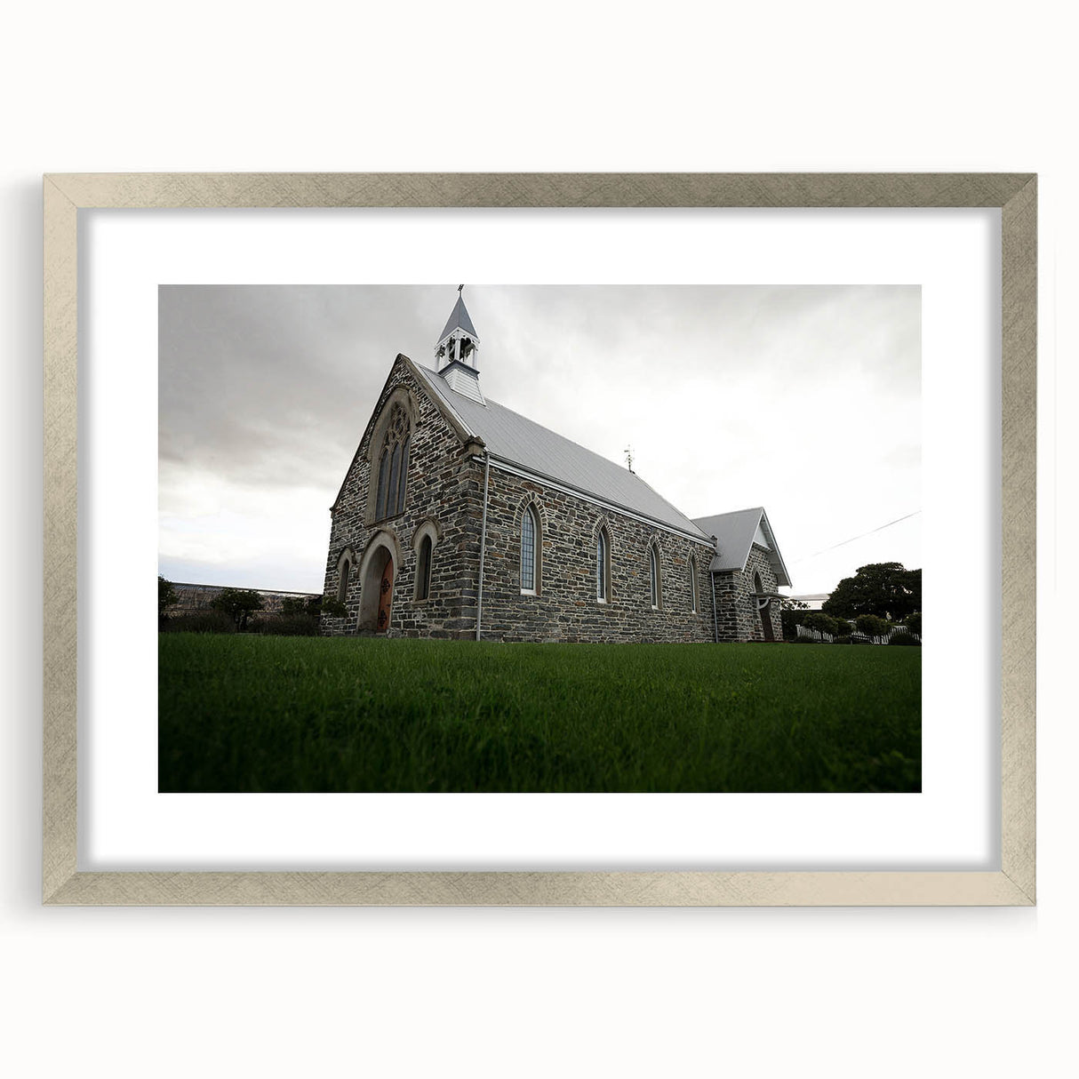 Textured art of abstract New Zealand Otago landscape in muted earth tones, framed in silver, ideal for bedroom art.