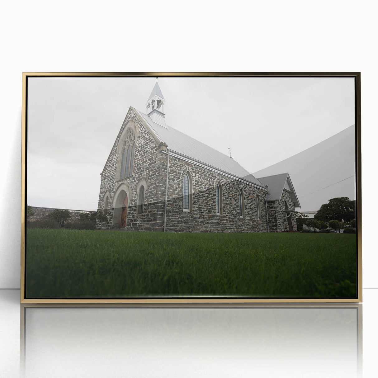 Large art print of Otago, New Zealand scenery in a gold frame, featuring mid-century modernist style.