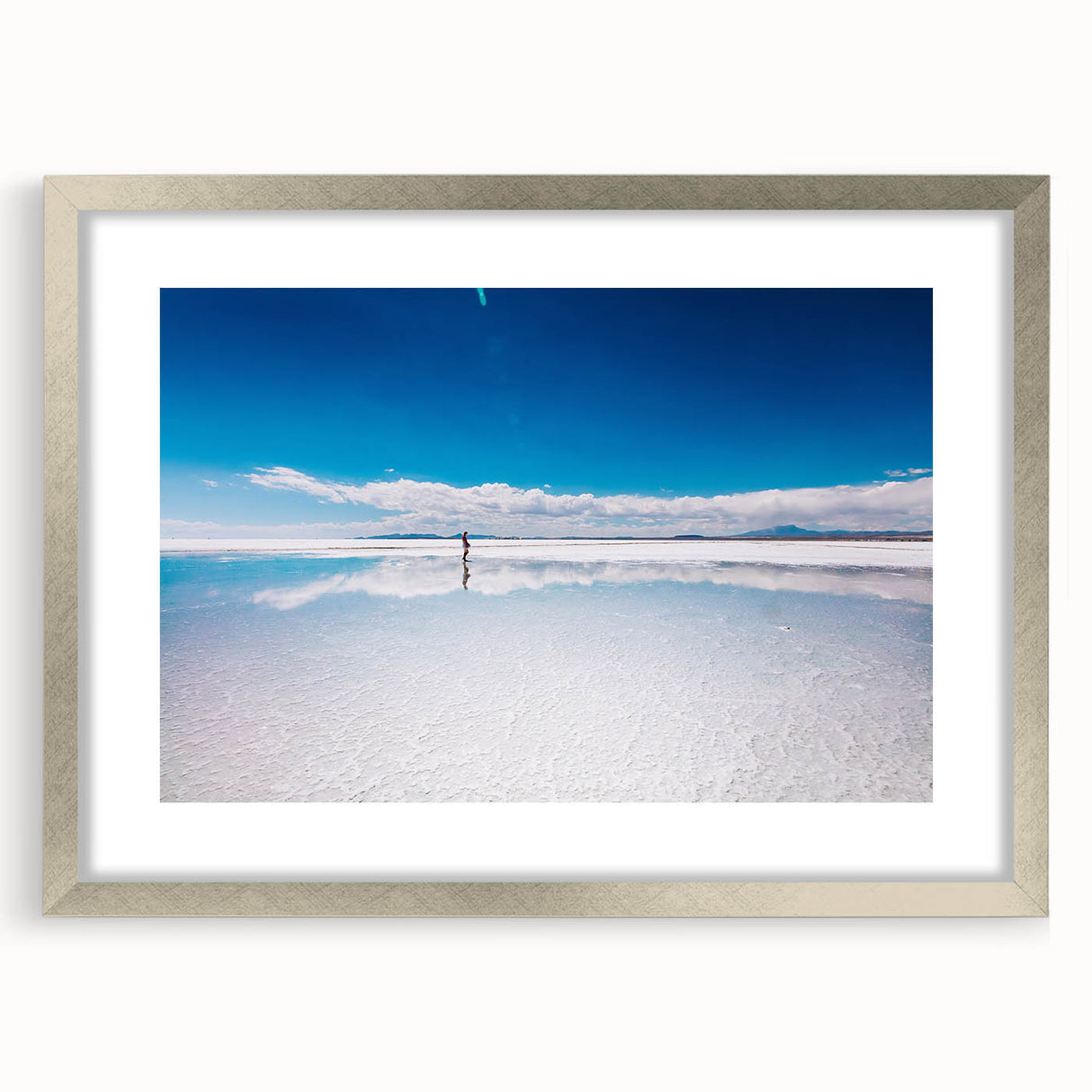 Textured abstract art print of a Bolivian landscape in muted earth tones on a framed silver canvas.