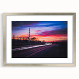 Textured abstract art print of Alabama scenery in muted earth tones, framed in silver, ideal for bedroom decor.