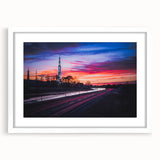 Abstract art print of Alabama scenery in muted earth tones on a white-matted frame.