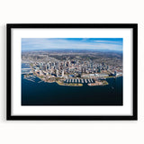 Abstract art print of San Diego scenery in vibrant colors on a large framed canvas, ideal for living room decor.