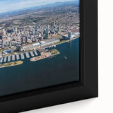 Close-up of textured black wall art featuring a colorful San Diego scenery on a framed canvas, ideal for living room decor.