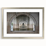 Textured abstract art print of Connecticut scenery in muted earth tones, framed in silver, suitable for bedroom decor.