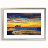 Textured art print of abstract Daytona scenery in muted blue and gray tones on a framed canvas, suitable for bedroom decor.