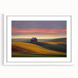 Abstract art print of Idaho scenery in muted earth tones on a framed white mat, suitable for dining room decor.