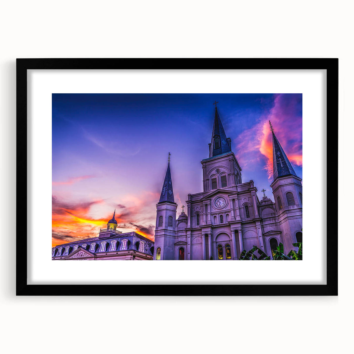 Colorful abstract art print of New Orleans scenery in vibrant hues on a large framed canvas, ideal for living room decor.