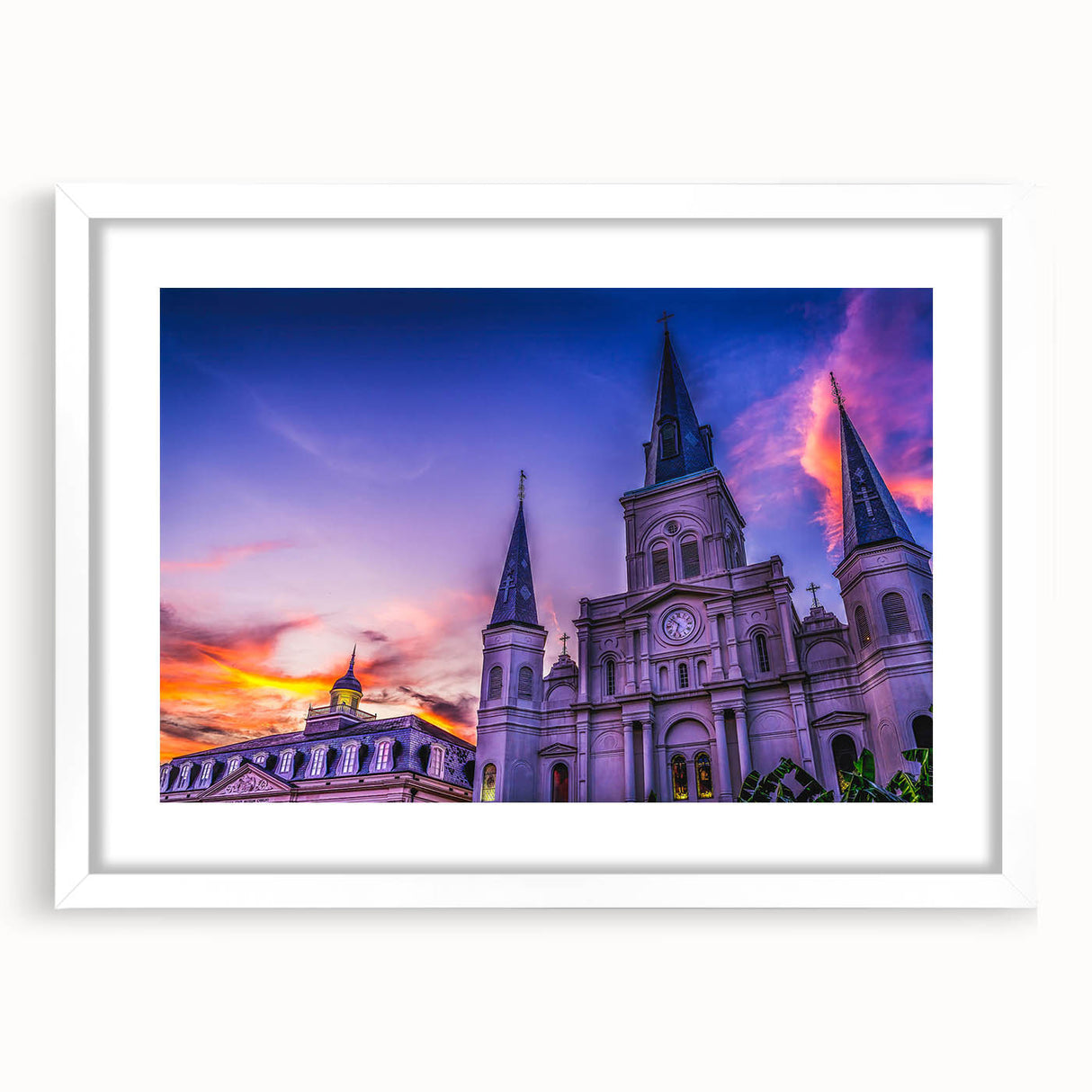 Abstract art print of New Orleans skyline in muted blue and gray tones, framed with a white mat.
