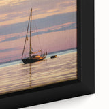 Close-up of a textured black wall art depicting a colorful Louisiana landscape on a framed canvas.