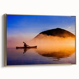 Framed canvas featuring a vintage-style landscape painting of Maine's coast with muted gold and black tones.