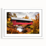 Abstract art print of Vermont scenery in muted green and blue tones, framed with a white mat.