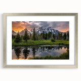 Textured art print of Wyoming's Grand Tetons in muted earth tones on a silver-framed mat, suitable for bedroom decor.