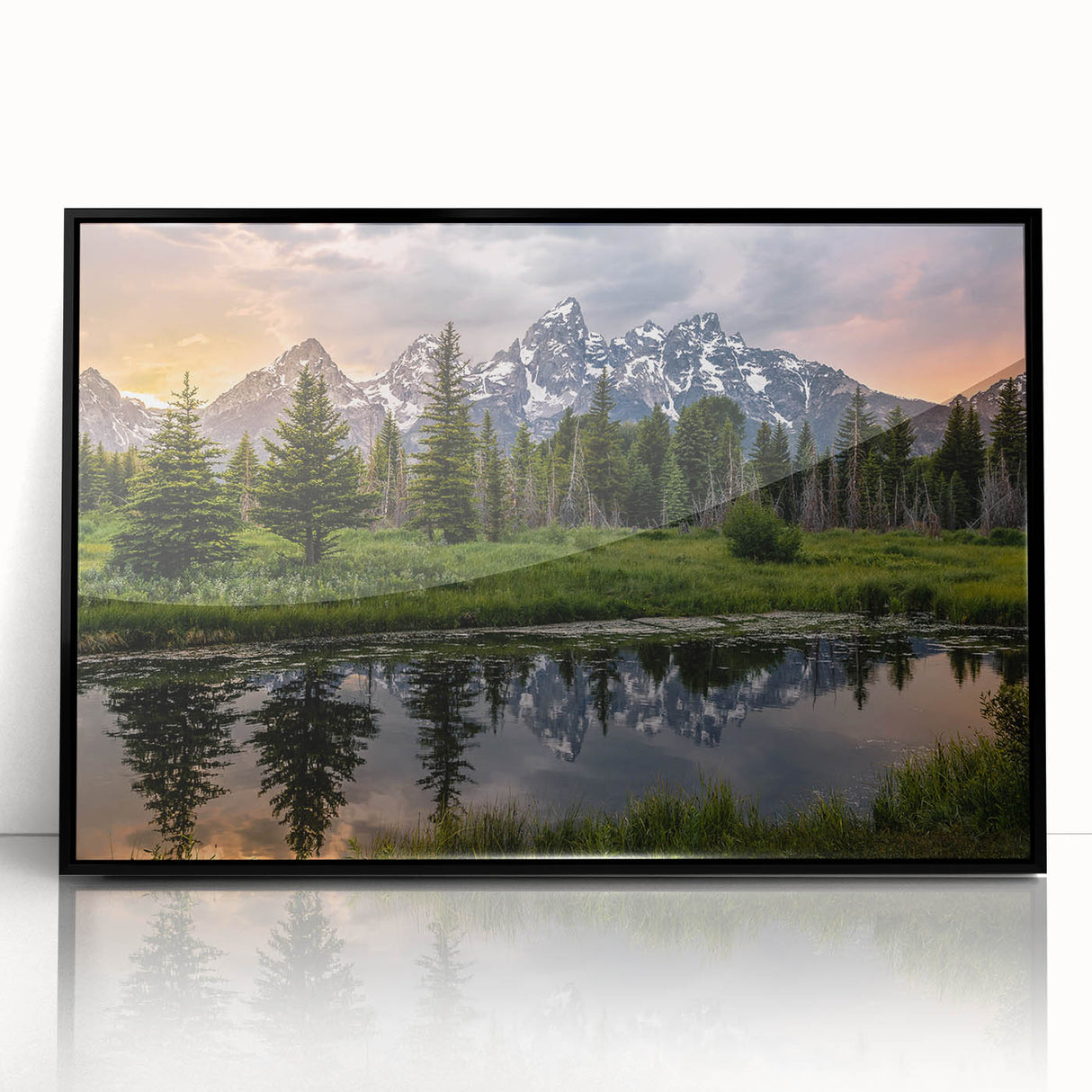 Large abstract wall art depicting the Grand Tetons, in muted earth tones, framed in black acrylic.