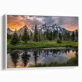Framed canvas of vintage poster art featuring Wyoming's Grand Tetons in muted earth tones, ideal for living room decor.