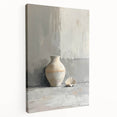 Abstract minimalist wall art on stretched canvas showcasing soft hues of blue and beige, elegantly displayed from a side view, perfect for modern decor.