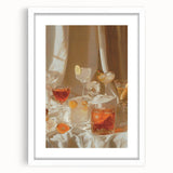 Abstract art print of assorted beverages in muted earth tones on a white framed canvas, suitable for dining room decor.