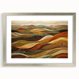 Textured abstract art print in orange and brown tones, framed in silver, suitable for bedroom decor.