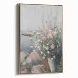 Framed canvas artwork showcasing abstract floral designs in vibrant colors with a gold frame, ideal for modern home decor. This stylish piece adds elegance to any room.