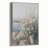 Framed canvas artwork showcasing an abstract floral design with vibrant colors and silver accents, ideal for modern home decor or art enthusiasts.