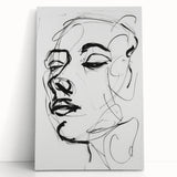 Abstract figurative stretched canvas artwork featuring vibrant colors and dynamic shapes, leaning against a textured wall, ideal for modern home decor and artistic spaces.