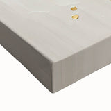 Close-up view of a vibrant abstract floral stretched canvas artwork, showcasing intricate details and rich colors, perfect for modern home decor.