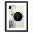 Abstract minimalist wall art framed in black with a white mat, showcasing geometric shapes and soft color tones, ideal for modern home decor.