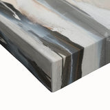 Close-up of an abstract figurative stretched canvas artwork showcasing vibrant colors and intricate details, perfect for modern home decor or art collectors.