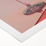 Art deco poster featuring a vintage cocktail glass, in muted gold and black tones on rolled canvas.