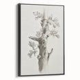 Framed canvas artwork showcasing an abstract floral design with vibrant colors on a black background, viewed from the side, ideal for modern home decor.