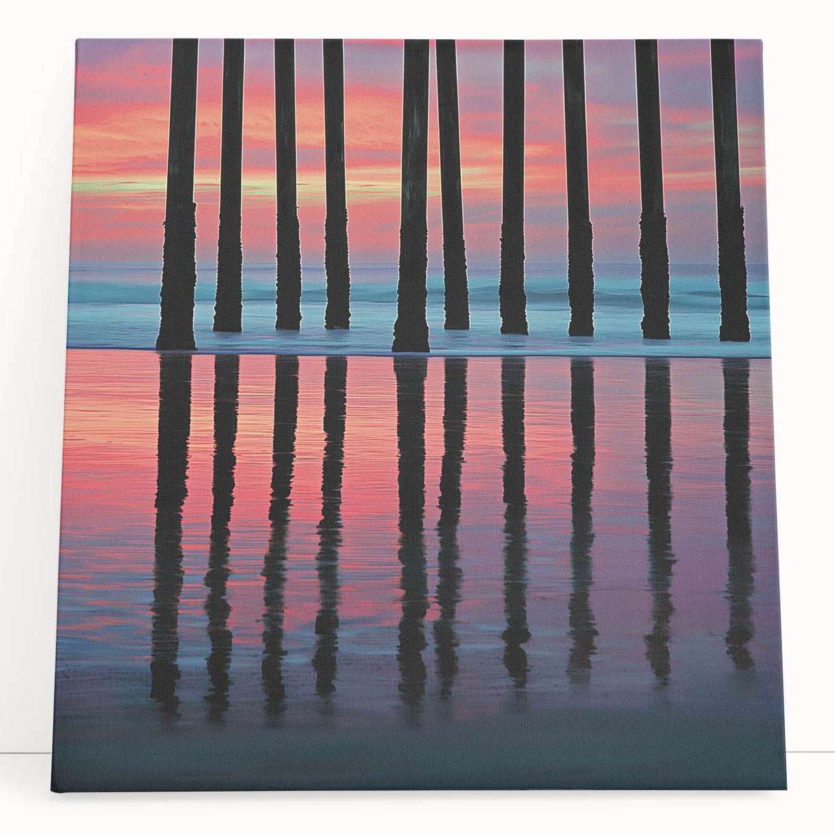 Abstract landscape stretched canvas artwork showcasing vibrant hues of blue and green, leaning against a textured wall, perfect for modern home decor.