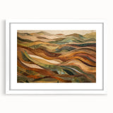Abstract art print depicting swirling autumn colors in muted oranges and browns, framed in white.