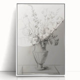 Framed acrylic artwork showcasing an abstract floral design in vibrant colors, set against a sleek white background, ideal for modern home decor.