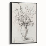 Framed canvas artwork showcasing vibrant abstract florals in shades of pink, blue, and green, presented in a sleek black frame, ideal for modern home decor.