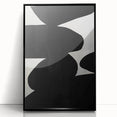 Framed abstract minimalist wall art featuring bold black shapes on a white background, ideal for modern decor, showcased from a front view, emphasizing its sleek design and contemporary style.